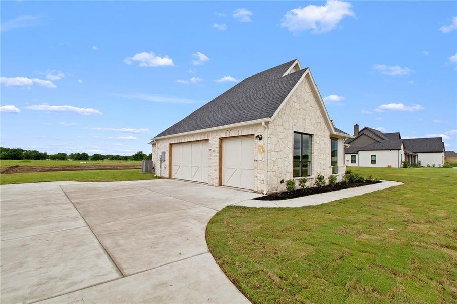 Front exterior of a new home in , Waxahachie, TX, highlighting curb appeal (Image 23).