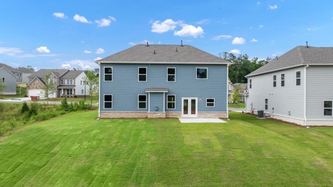 Front exterior of a new home in Butner Estates, South Fulton, GA, highlighting curb appeal (Image 27).