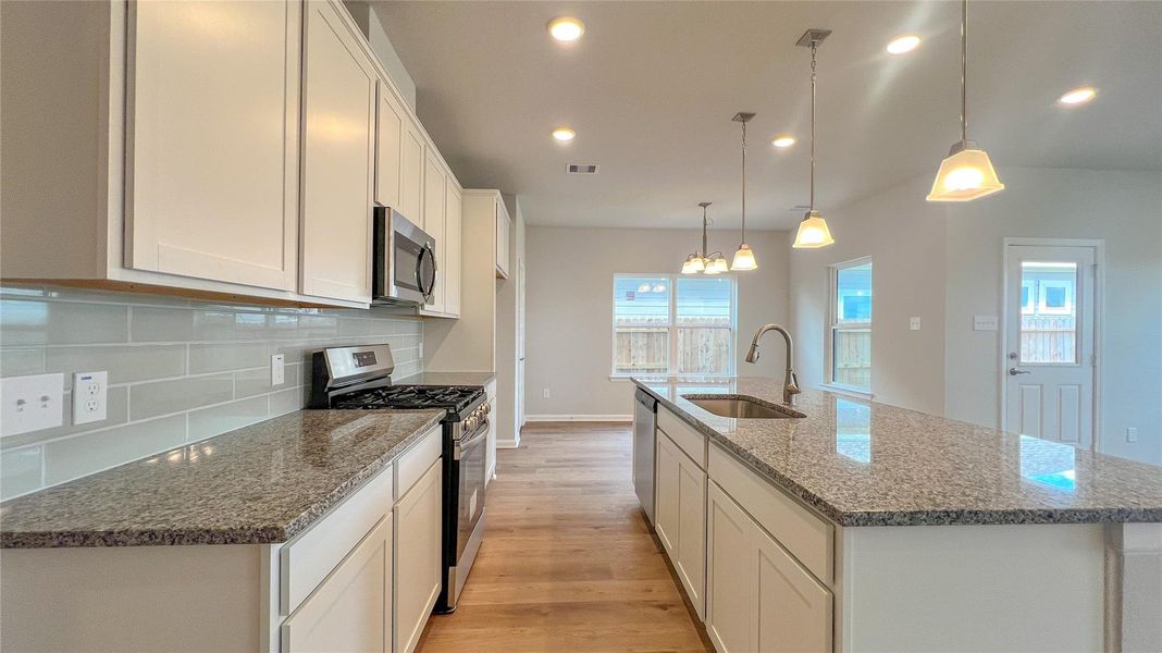 The Brambling- Kitchen. Sample floor plan image for illustration; upgrades, options, and colors may vary.