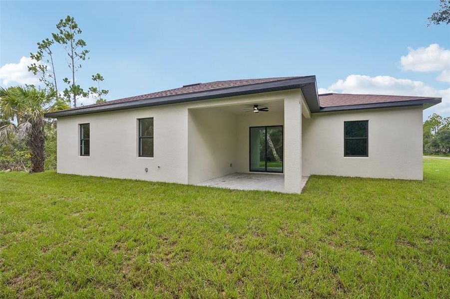Exterior details and patio area of a home in , North Port (Image 16).