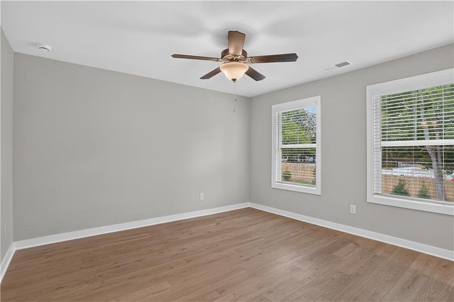 Spacious, unfurnished interior of a new home in The Cottages at East Lanier, Fayetteville (Image 17).