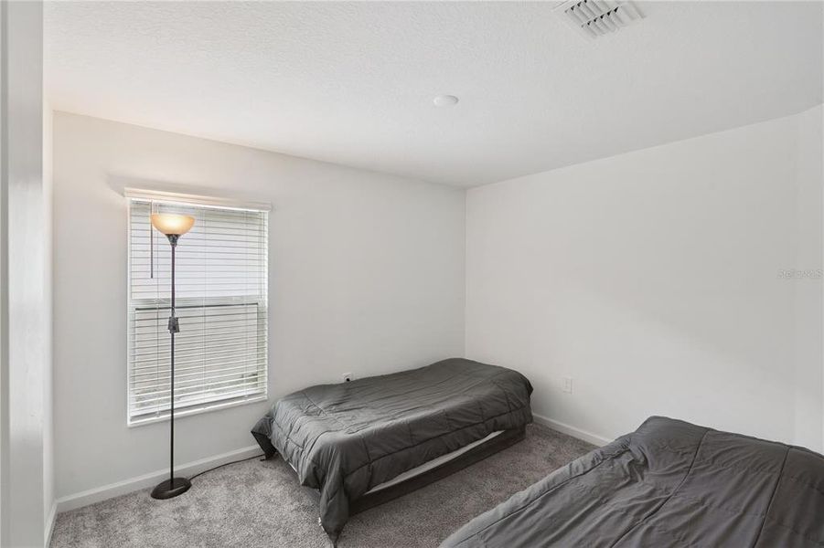 Furnished interior view inside a new home in Lawson Dunes, Haines City (Image 10).