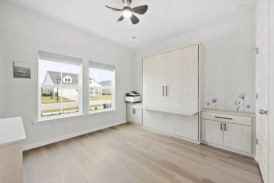 Spacious, unfurnished interior of a new home in Horizons at Summers Corner | 55+, Summerville (Image 22).