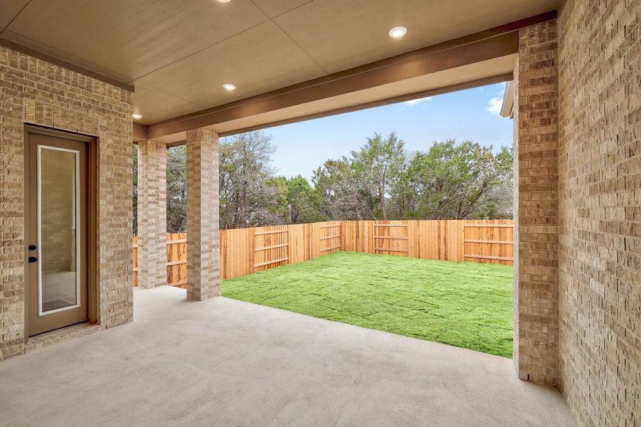 Exterior details and patio area of a home in Parkside On The River, Georgetown (Image 3).