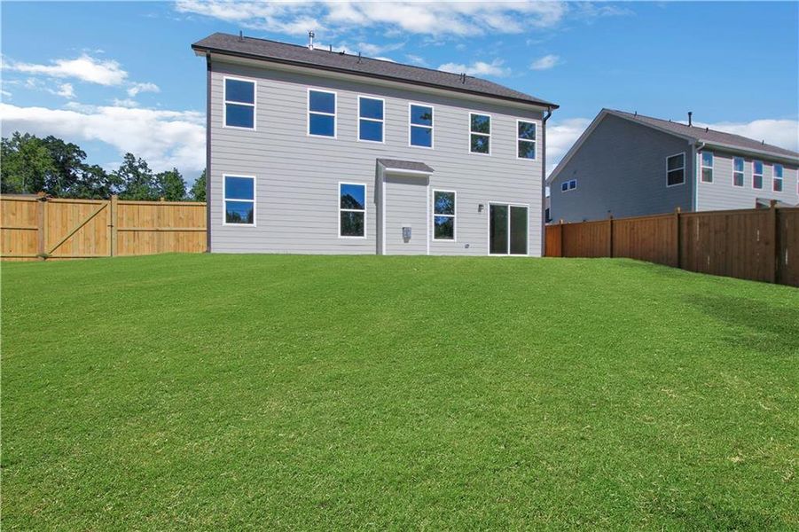 Exterior details and patio area of a home in Marble Tree, Ball Ground (Image 2).