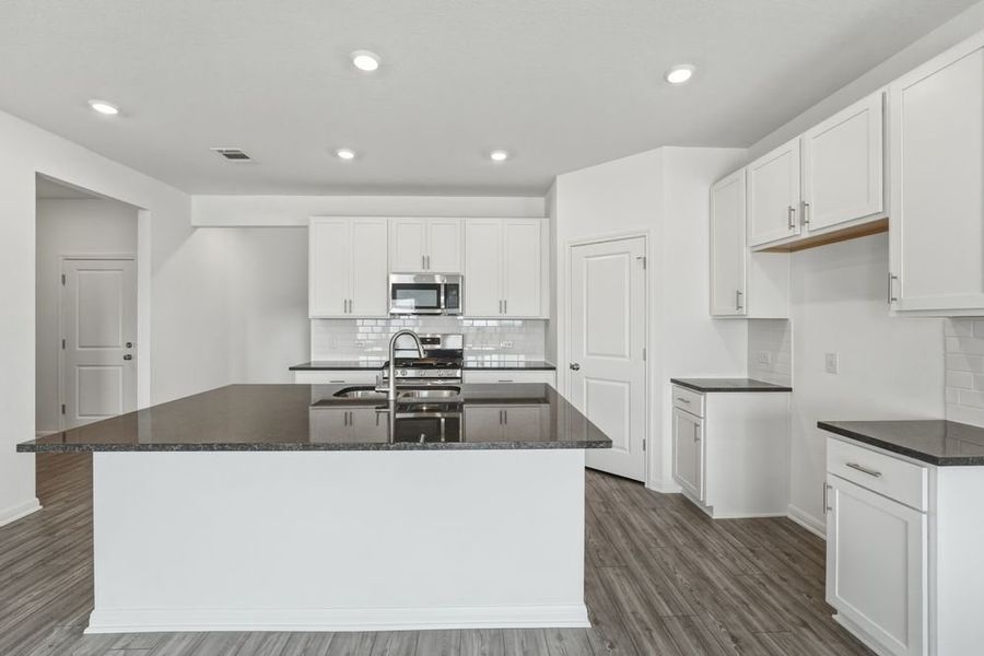 Furnished interior view inside a new home in Longview, Del Valle (Image 4).