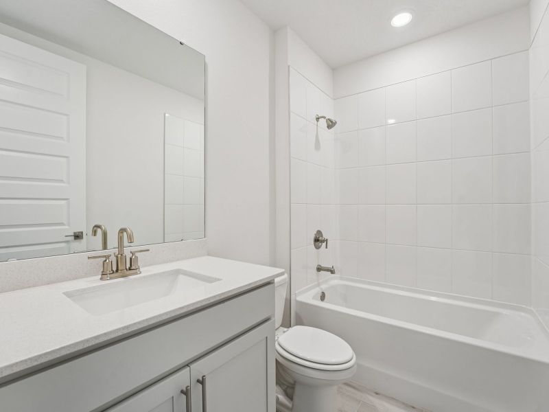 Furnished interior view inside a new home in The Grove at Stuart Crossing - Signature Series, Bartow (Image 5).