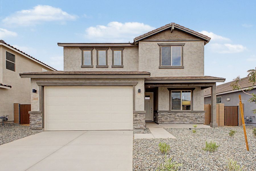 Front exterior of a new home in Soleo, San Tan Valley, AZ, highlighting curb appeal (Image 1). Front exterior of a new home in Soleo, San Tan Valley, AZ, highlighting curb appeal (Image 1).