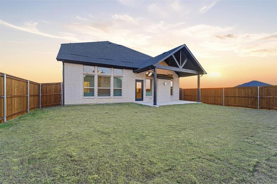 Exterior details and patio area of a home in Green Meadows, Celina (Image 2).