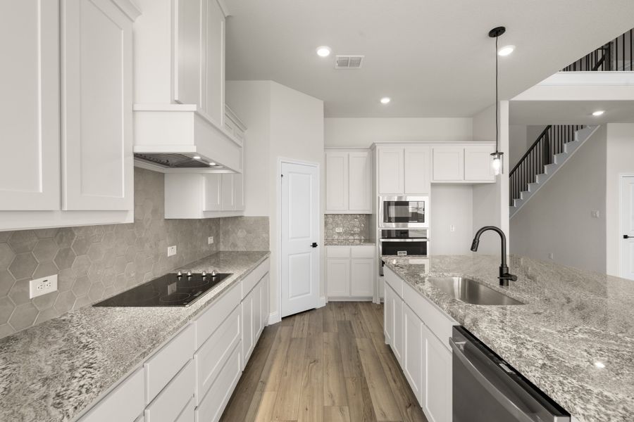 Furnished interior view inside a new home in Coyote Crossing, Godley (Image 7).