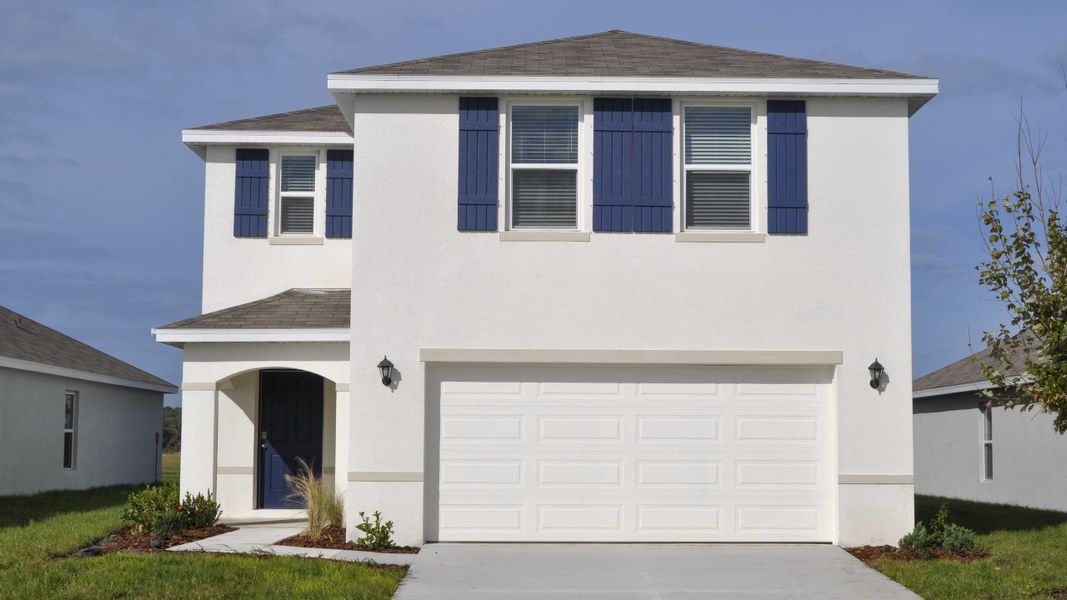 Representative exterior photo of a completed home built from the Elston by D.R. Horton in Oakfield Trails, Parrish, FL (Image 2).