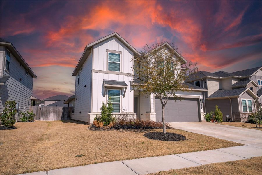 Front exterior of a new home in Mason Woods, Cypress, TX, highlighting curb appeal (Image 2). Front exterior of a new home in Mason Woods, Cypress, TX, highlighting curb appeal (Image 2).
