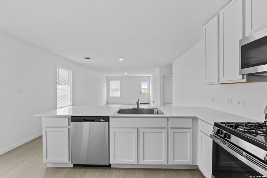Furnished interior view inside a new home in Spring Grove, St. Hedwig (Image 8).