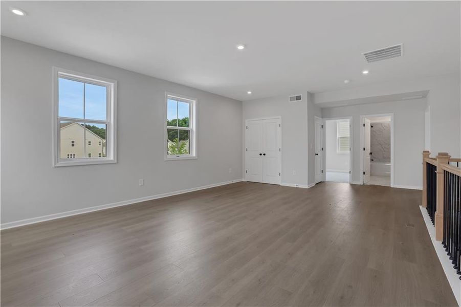 Spacious, unfurnished interior of a new home in The Paddocks at Doc Hughes, Buford (Image 42).