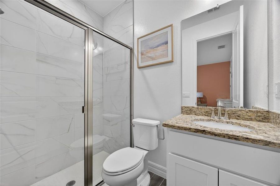 Furnished interior view inside a new home in Heritage Station, Punta Gorda (Image 33).