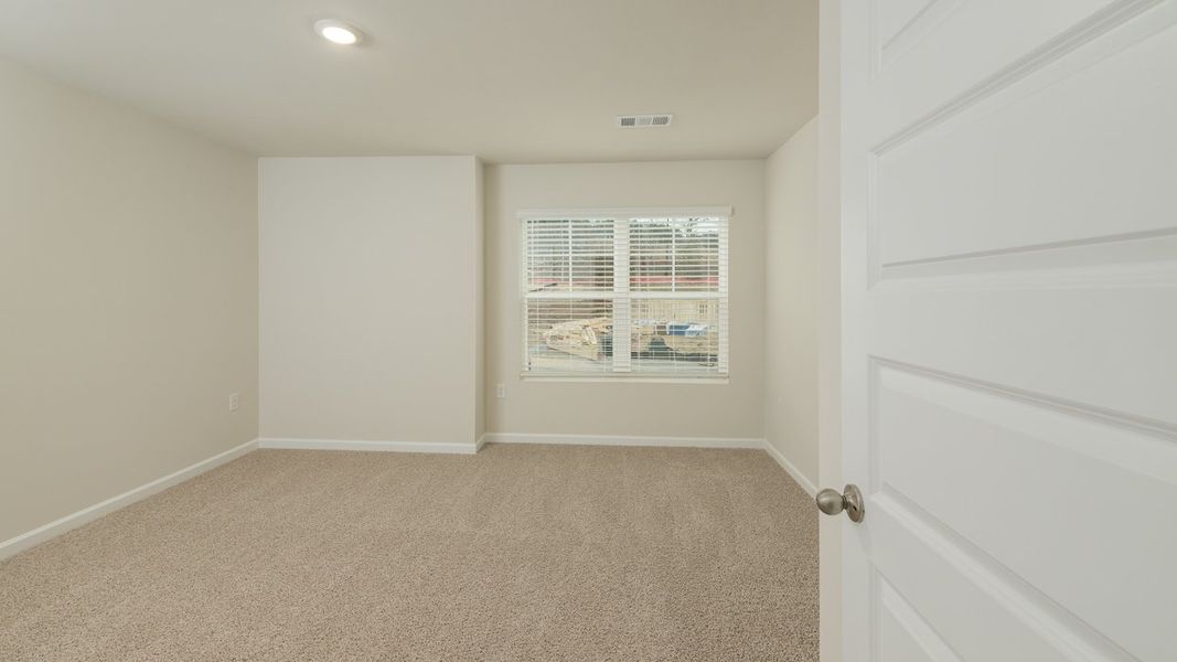 Spacious, unfurnished interior of a new home in Brooks Station, Dacula (Image 32).