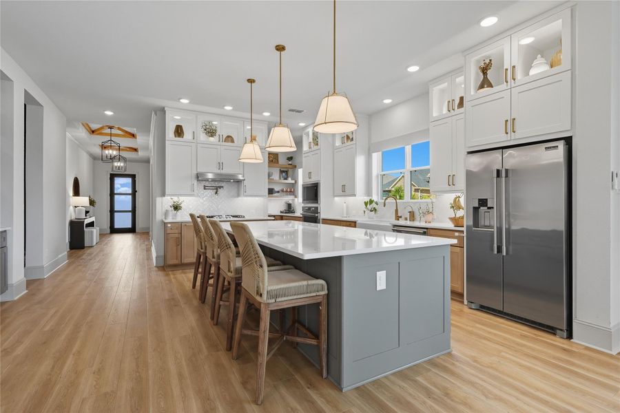 View of entry way and kitchen. View of entry way and kitchen.