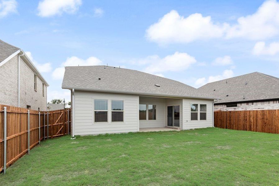 Exterior details and patio area of a home in Stella Hills, Denton (Image 3).