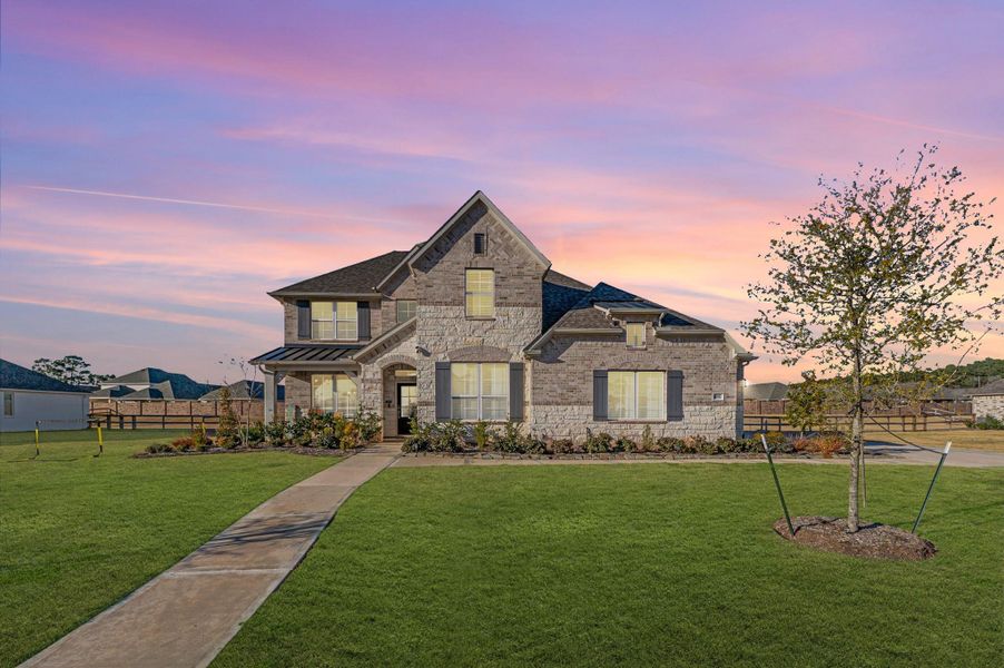 Front exterior of a new home in Lone Star Landing, Montgomery, TX, highlighting curb appeal (Image 24).