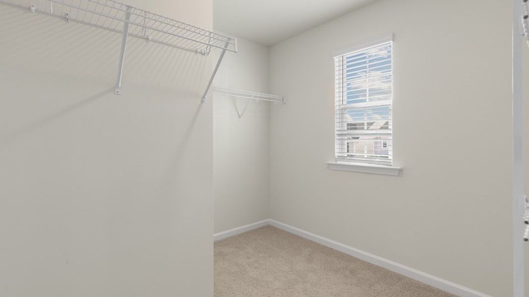 Spacious, unfurnished interior of a new home in The Grove at Matthews Landing, Fuquay Varina (Image 28).