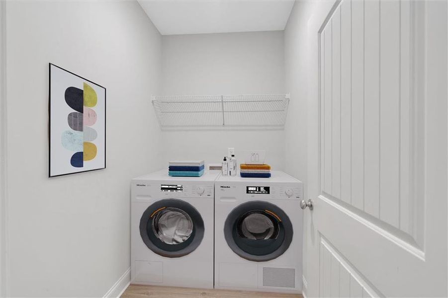 Furnished interior view inside a new home in Heritage Pointe at The Georgian, Villa Rica (Image 9).