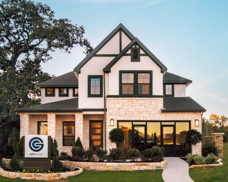 Front exterior of a new home in Parmer Ranch, Georgetown, TX, highlighting curb appeal (Image 3).