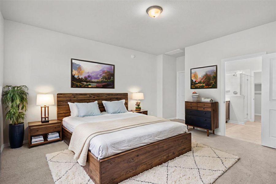 Another virtually staged view of the primary bedroom shows how easily it accommodates a cozy sitting area or reading nook. Its soft color palette and generous layout provide the ideal foundation for your personal design style. Another virtually staged view of the primary bedroom shows how easily it accommodates a cozy sitting area or reading nook. Its soft color palette and generous layout provide the ideal foundation for your personal design style.