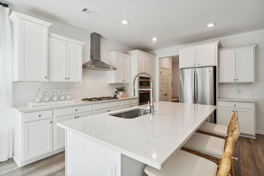 Furnished interior view inside a new home in Horizons at Carnes Crossroads | 55+: Legends Collection, Summerville (Image 9).
