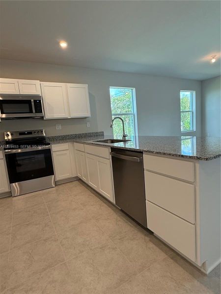 Furnished interior view inside a new home in , Florida City (Image 8).