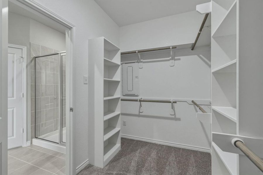 Primary Closet in the Cedar home plan by Trophy Signature Homes – REPRESENTATIVE PHOTO