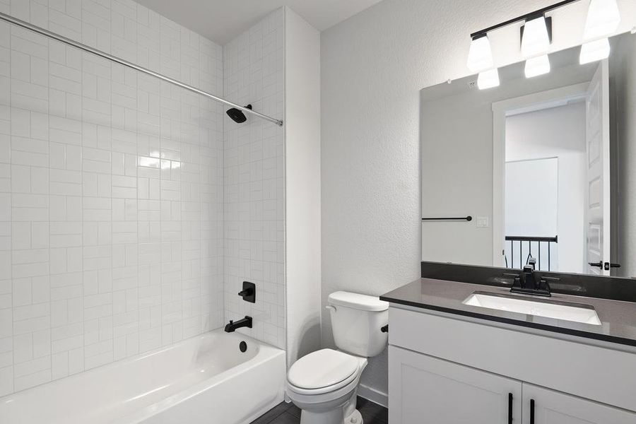 Furnished interior view inside a new home in Park Collection at Lariat, Liberty Hill (Image 27). Furnished interior view inside a new home in Park Collection at Lariat, Liberty Hill (Image 27).