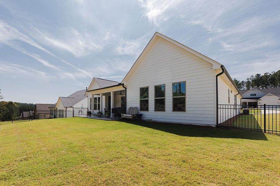Front exterior of a new home in Soleil Belmont Park, Canton, GA, highlighting curb appeal (Image 21).