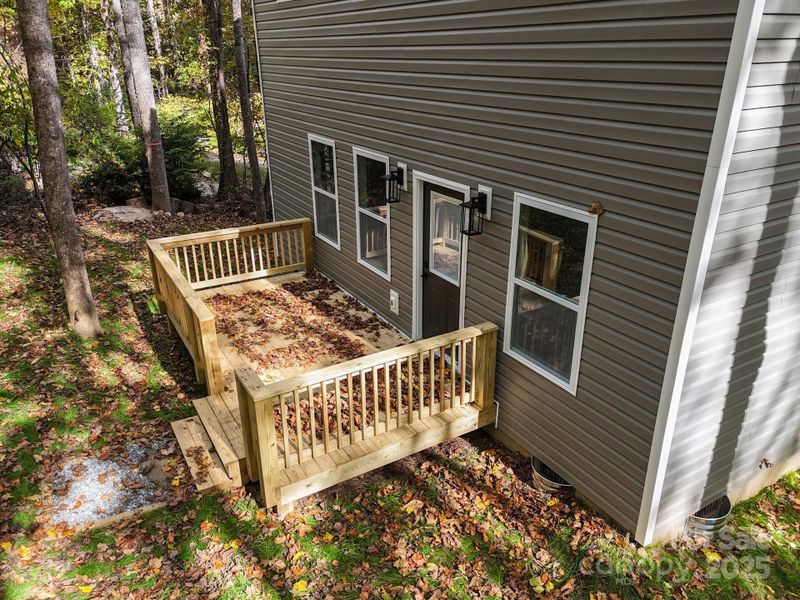 Exterior details and patio area of a home in , Maggie Valley (Image 3).