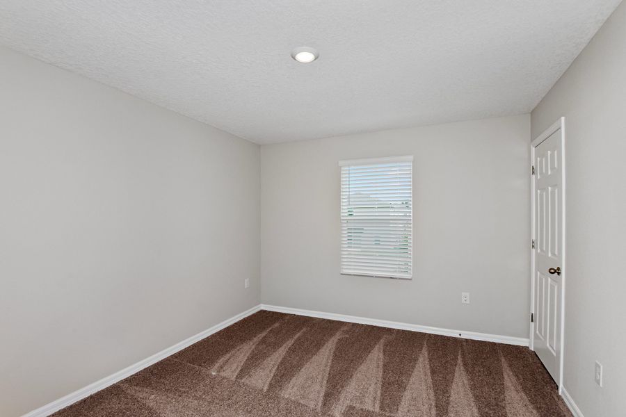 Spacious, unfurnished interior of a new home in Pasadena Ridge, Dade City (Image 22).