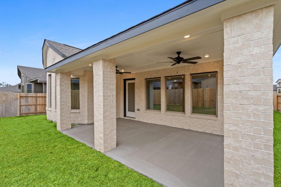Exterior details and patio area of a home in , Spring (Image 3).