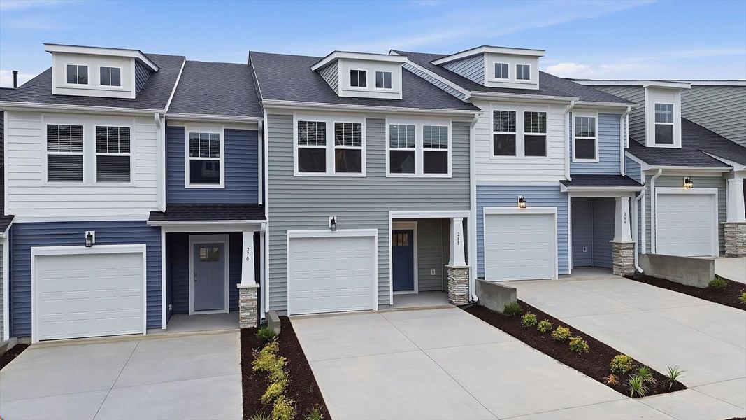 Exceptional home with tasteful exterior finishes and a thoughtfully designed façade by DRB Homes