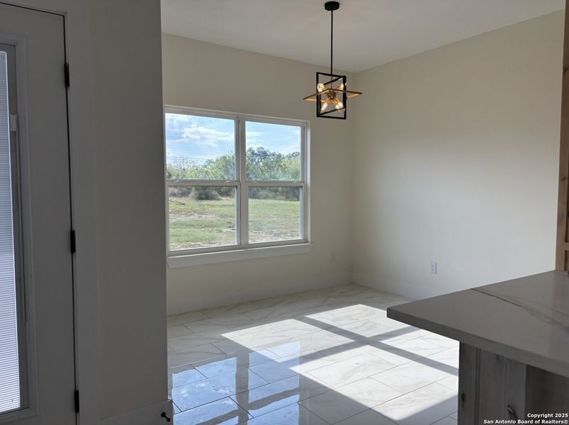Furnished interior view inside a new home in , Uvalde (Image 3).