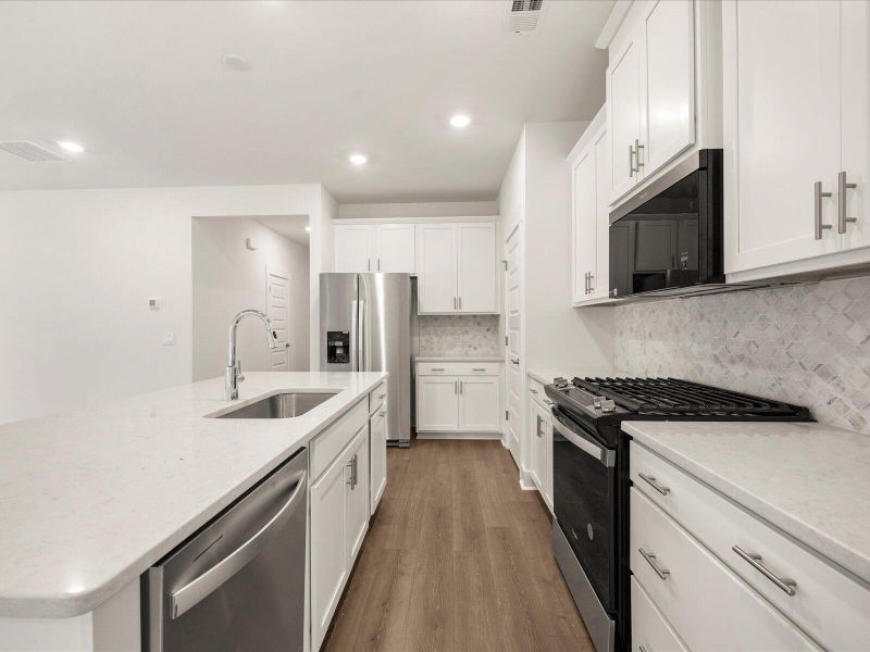 Furnished interior view inside a new home in The Coves at Lakes of Cane Bay, Summerville (Image 11). Furnished interior view inside a new home in The Coves at Lakes of Cane Bay, Summerville (Image 11).