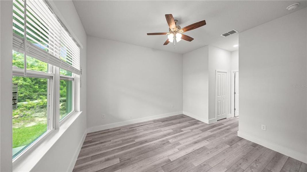 Spacious, unfurnished interior of a new home in , Port Charlotte (Image 36).