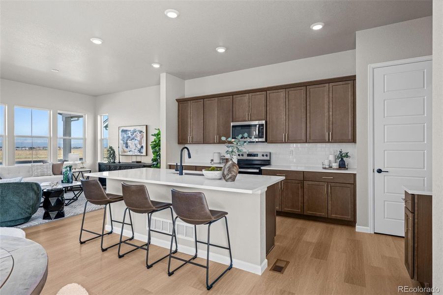 Furnished interior view inside a new home in Painted Prairie, Aurora (Image 13).