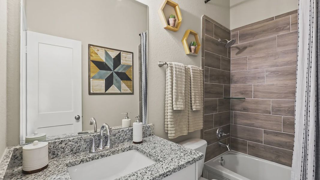 Representative furnished interior of a home built from the Oxford by Chesmar Homes in Bridgeland 45's, Cypress (Image 22).
