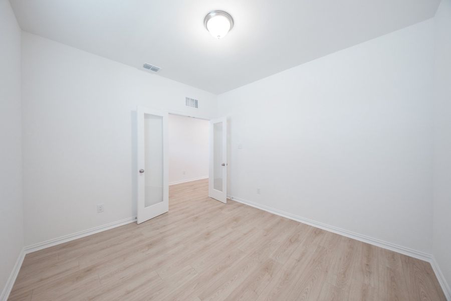 Spacious, unfurnished interior of a new home in Whitewing Trails, Princeton (Image 25).