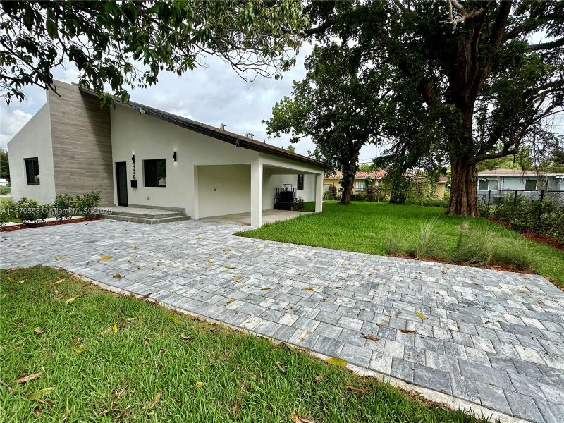Front exterior of a new home in , Miami, FL, highlighting curb appeal (Image 34).