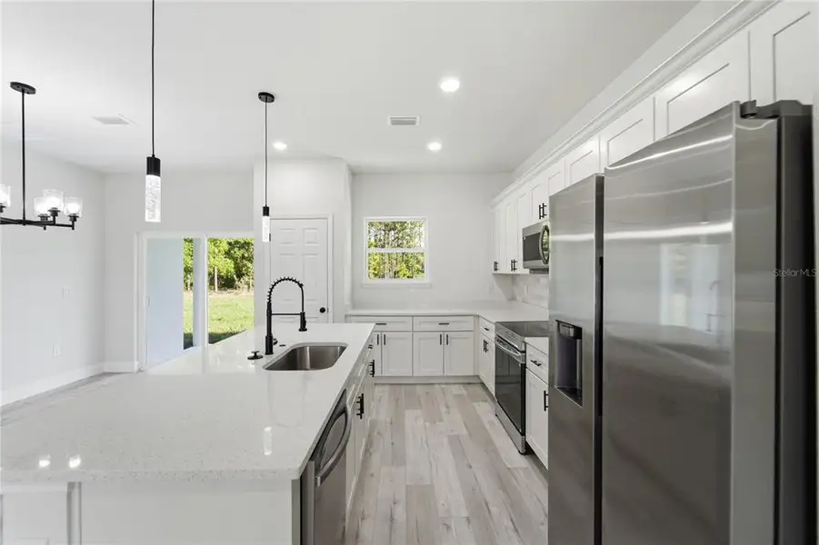 Furnished interior view inside a new home in , Citrus Springs (Image 6).