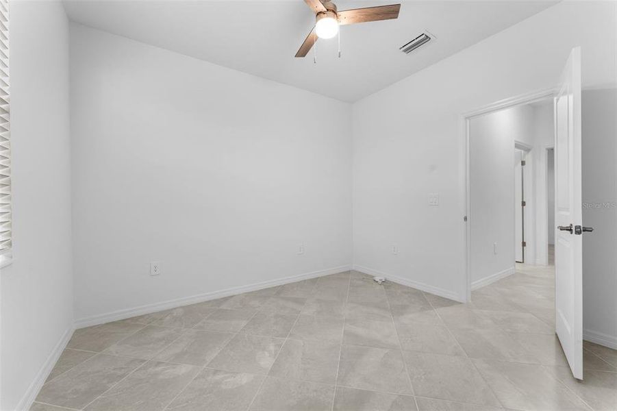 Spacious, unfurnished interior of a new home in , Port Charlotte (Image 35).