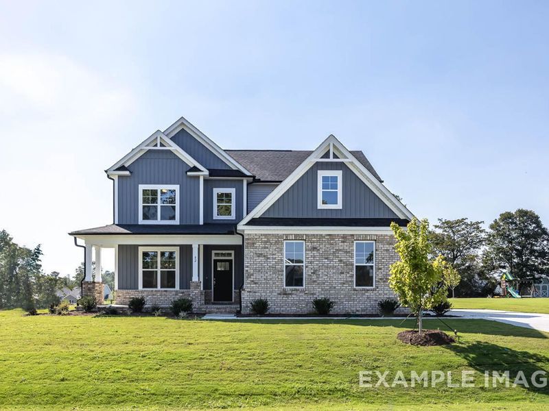 Front exterior of a new home in Tobacco Road, Angier, NC, highlighting curb appeal (Image 2). Front exterior of a new home in Tobacco Road, Angier, NC, highlighting curb appeal (Image 2).