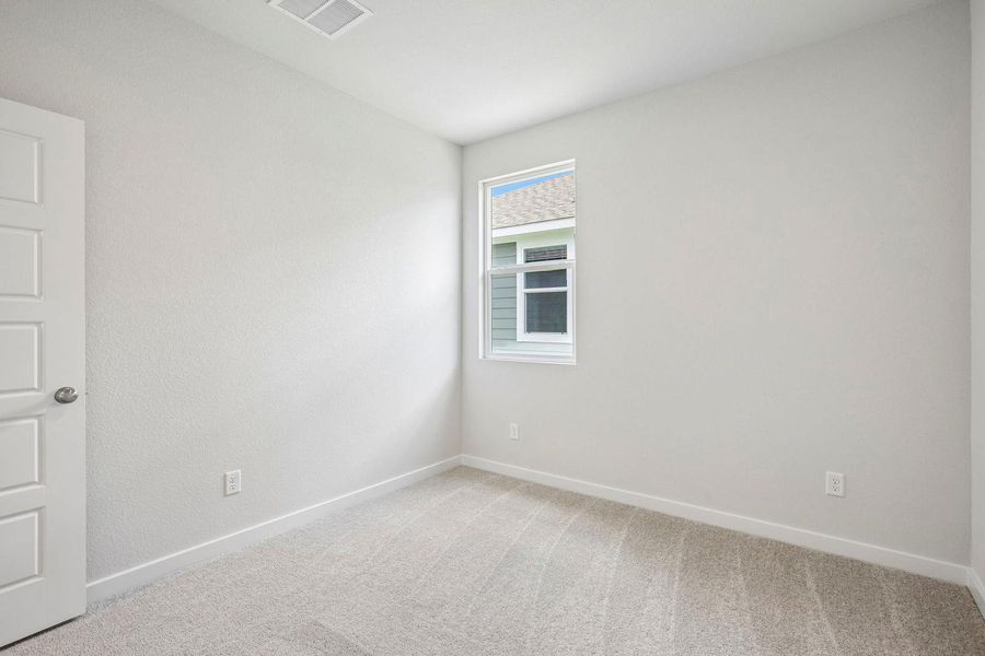 Spacious, unfurnished interior of a new home in Stallion Run, Buda (Image 24).