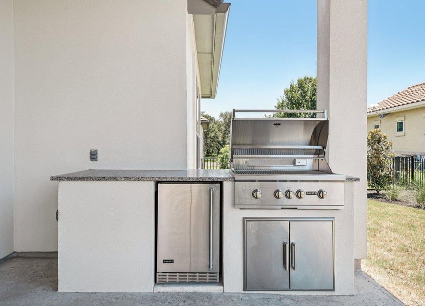 View of patio / terrace featuring exterior kitchen