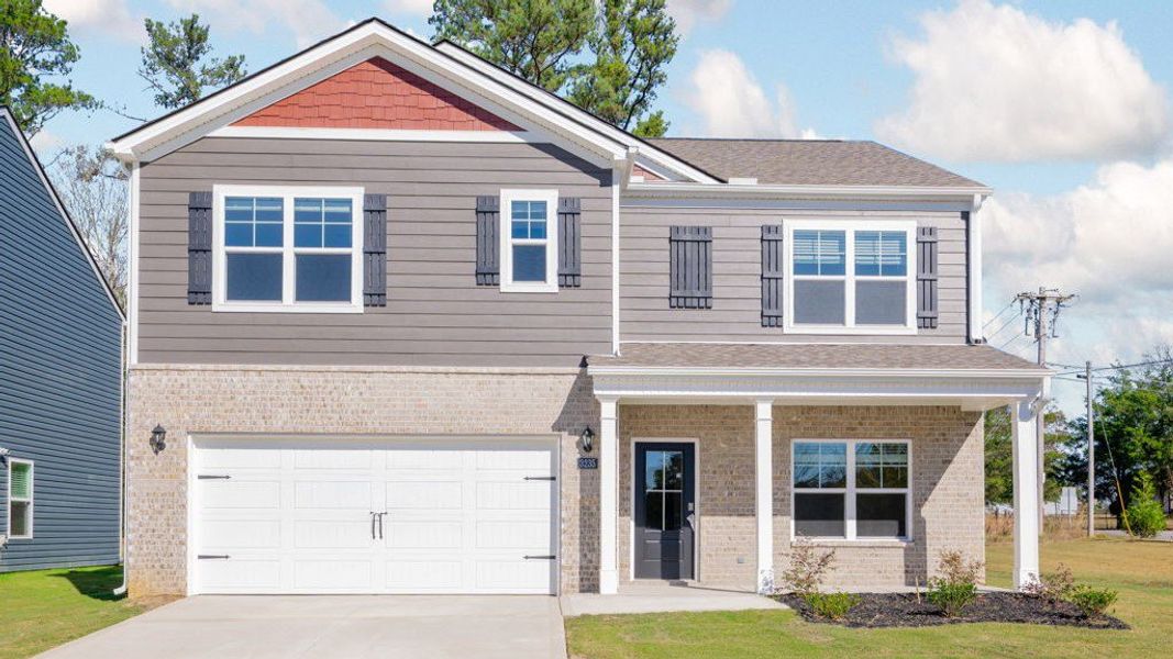 Front exterior of a new home in Hillcrest Landing, McDonald, TN, highlighting curb appeal (Image 1).