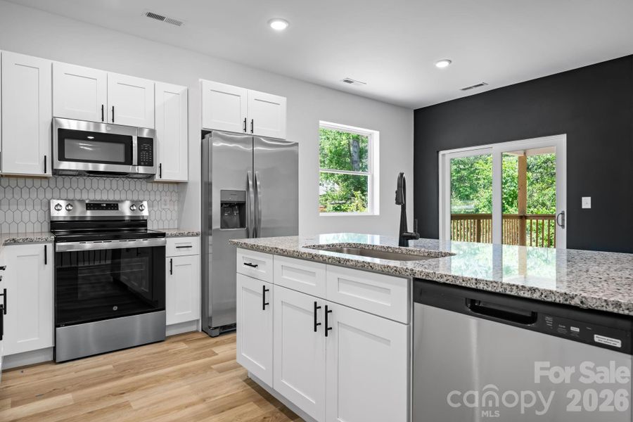 Furnished interior view inside a new home in , Taylorsville (Image 10).